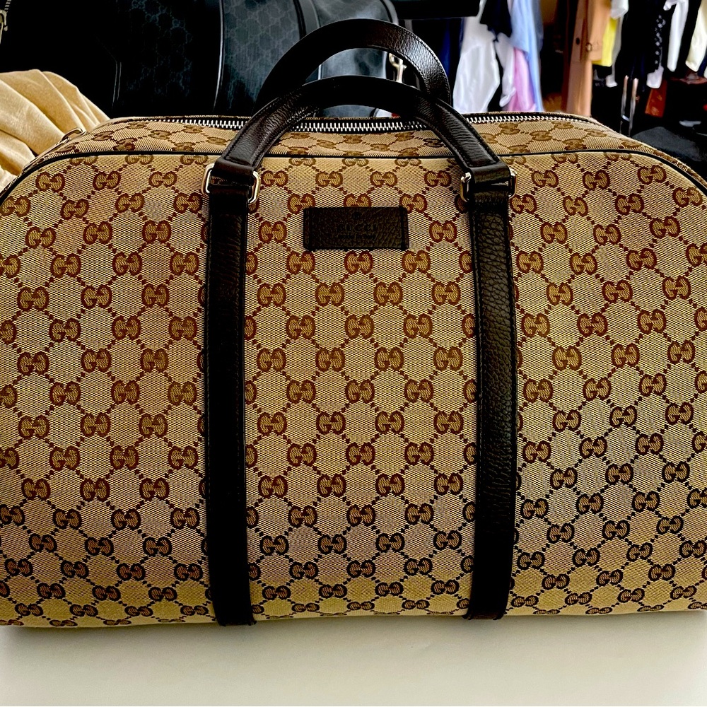 100% Authentic Gucci GG monogram duffle bag.